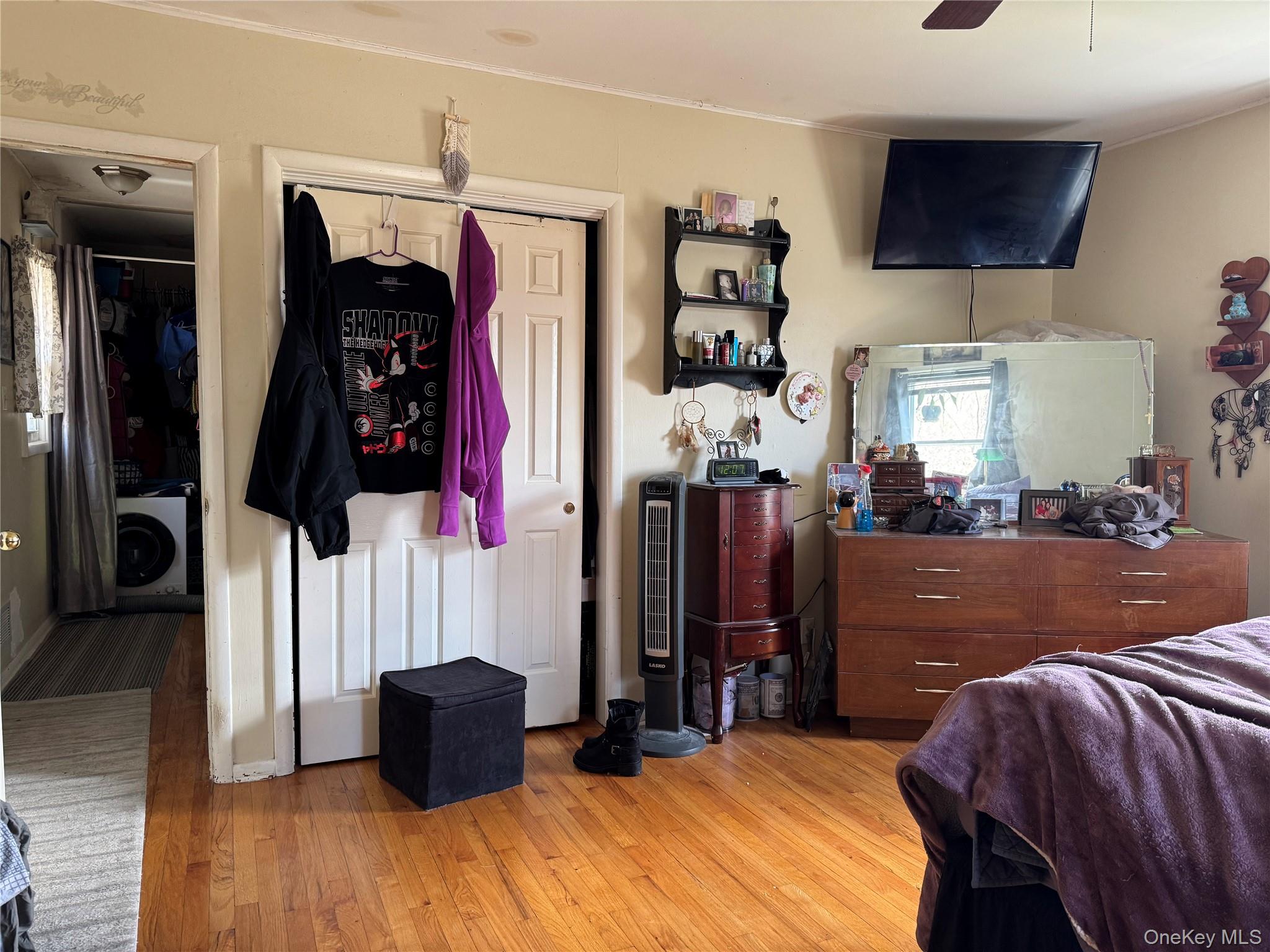 97 Deblock Road New Hampton, NY 10958 - Photo 13 of 31 a bed room with a bed and a television