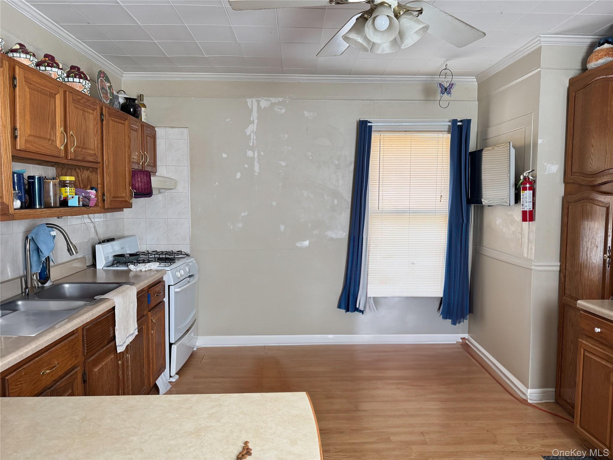97 Deblock Road New Hampton, NY 10958 - Photo 14 of 31 a kitchen with stainless steel appliances granite countertop a refrigerator a sink a stove and island
