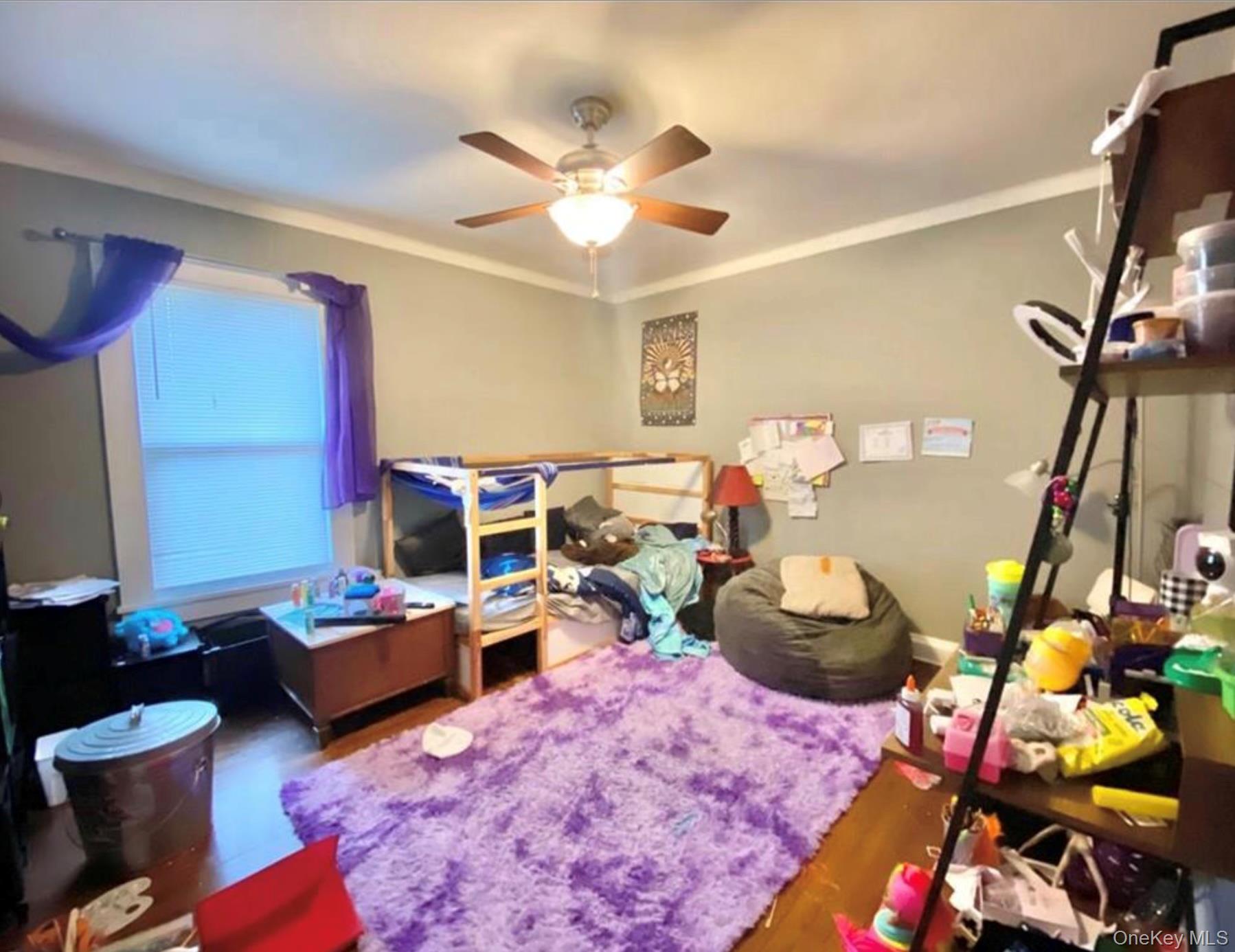 97 Deblock Road New Hampton, NY 10958 - Photo 20 of 31 a bedroom with furniture and a rug