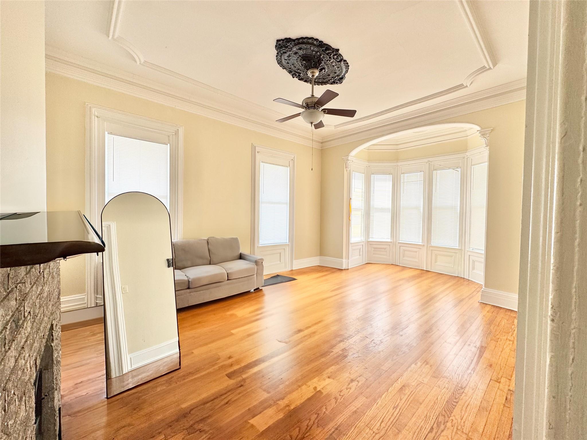 97 Deblock Road New Hampton, NY 10958 - Photo 22 of 28 a view of a livingroom with wooden floor and chandelier