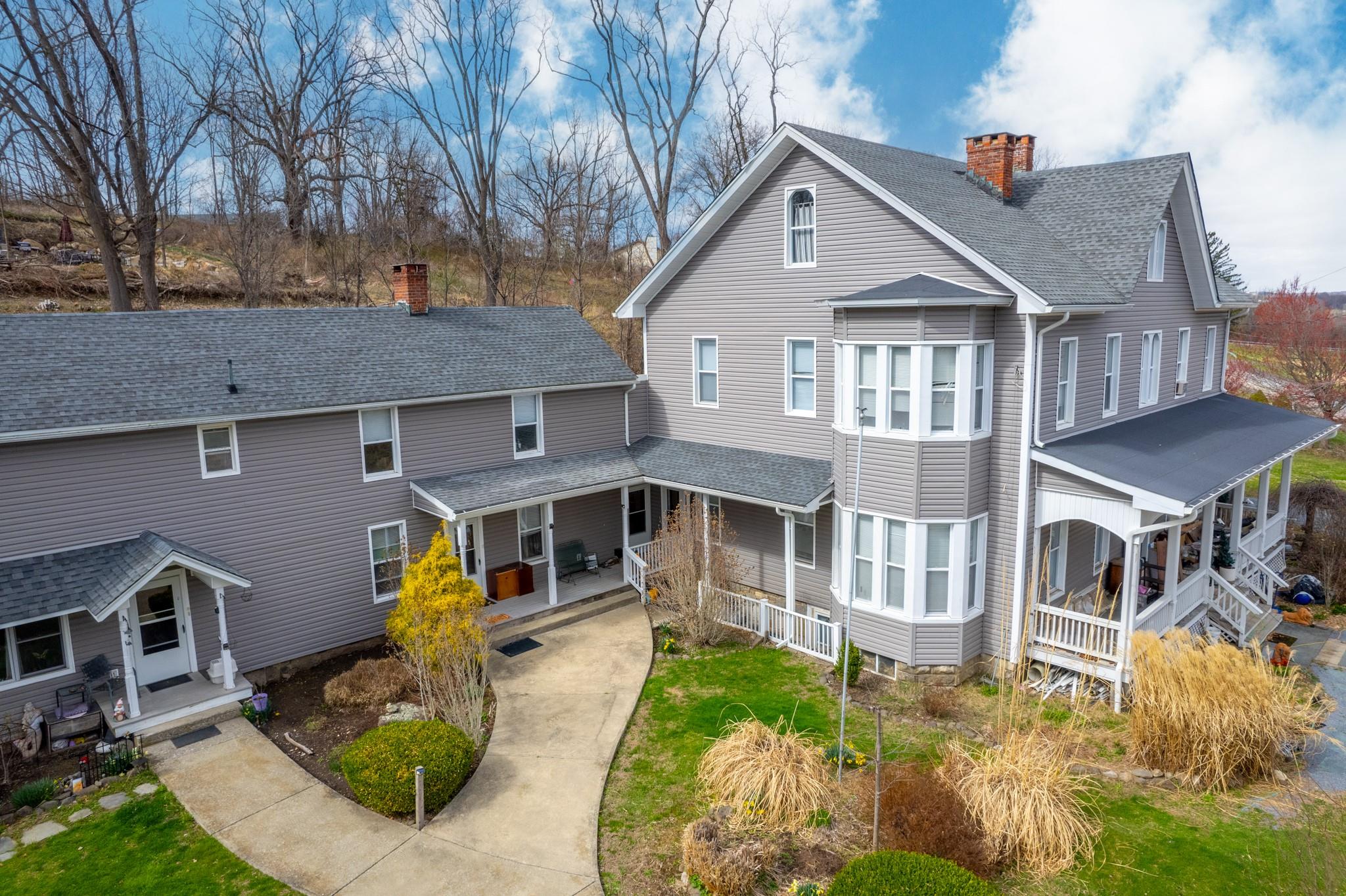 97 Deblock Road New Hampton, NY 10958 - Photo 5 of 28 a front view of a house with garden