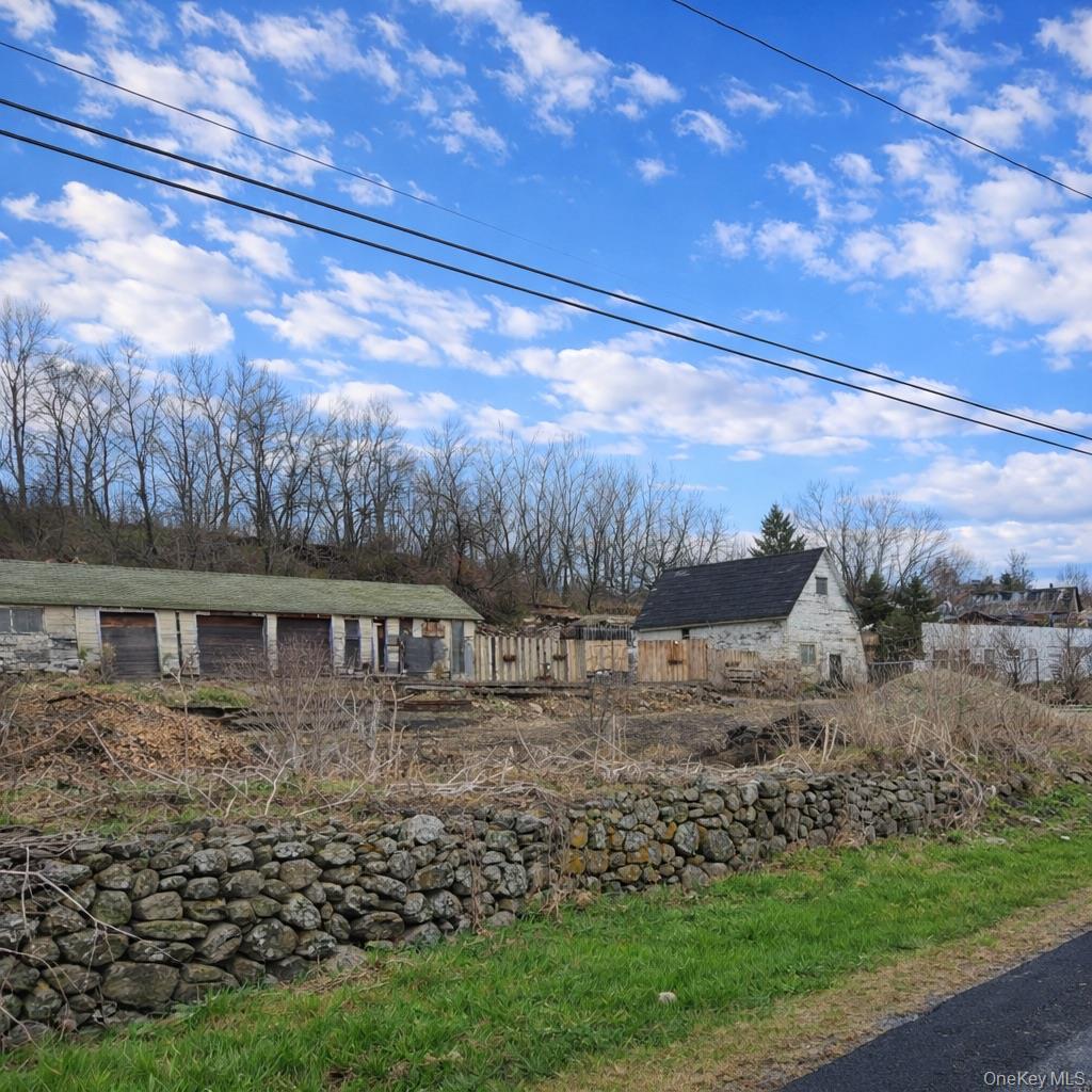 97 Deblock Road New Hampton, NY 10958 - Photo 6 of 31 a view of house with yard and sitting area