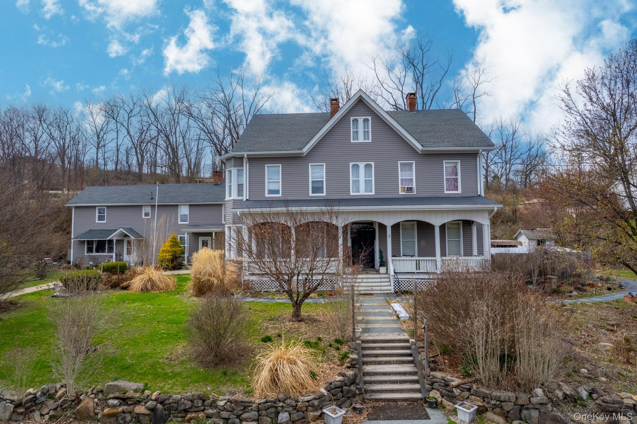 97 Deblock Road New Hampton, NY 10958 - Photo 7 of 31 a front view of a house with garden