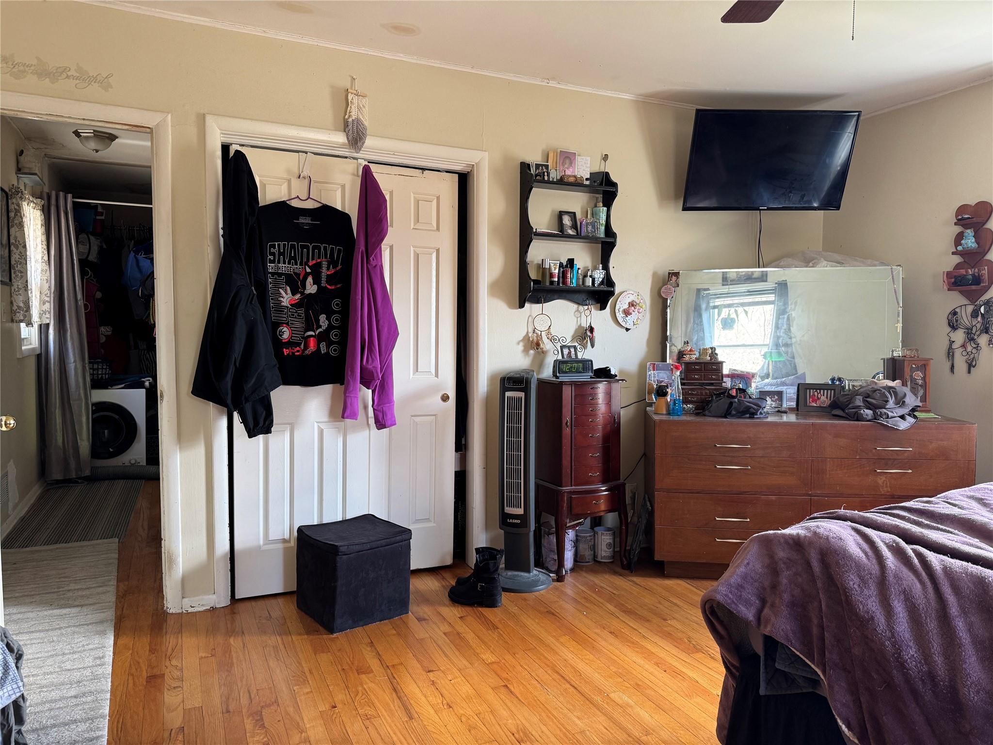 97 Deblock Road New Hampton, NY 10958 - Photo 10 of 28 a bed room with a bed and a television