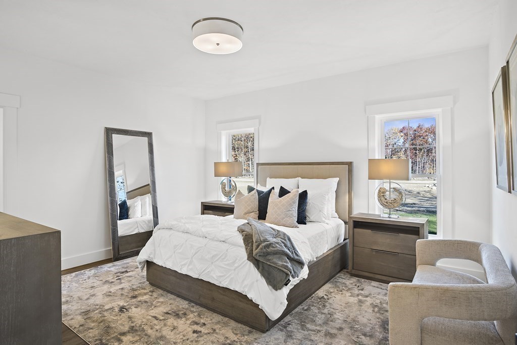 25 Salisbury Hill Boulevard, Unit 65 Worcester, MA 01609 - Photo 15 of 42 a bedroom with a bed and a couch