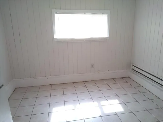 a view of a utility room and window