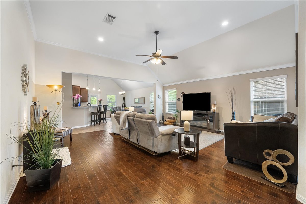 3000 Rio Verde Drive Leander, TX 78641 - Photo 4 of 23 a living room with furniture flat screen tv and wooden floor