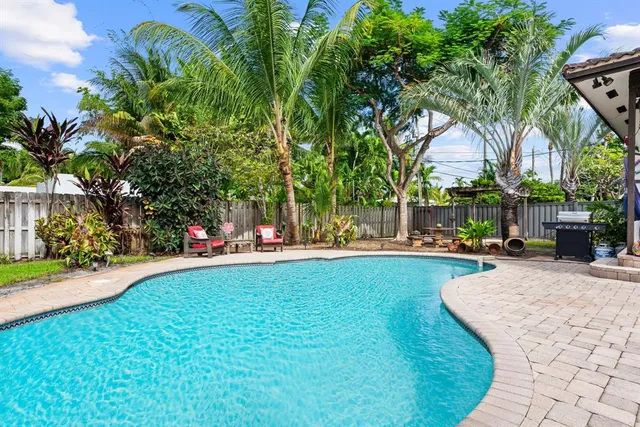 a view of outdoor space yard and swimming pool