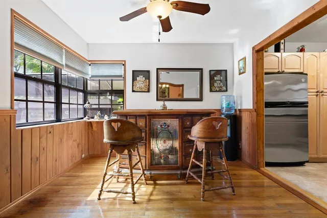 a view of a chairs in kitchen and bathroom