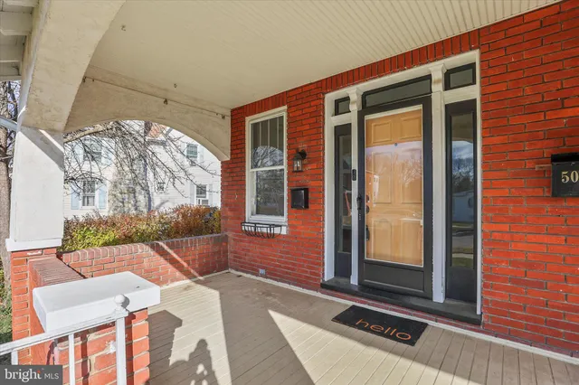 a view of backyard with a large window