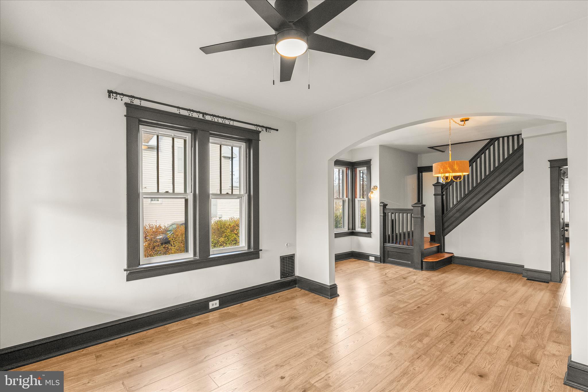 500 South Franklin Street Hanover, PA 17331 - Photo 6 of 36 a view of an empty room with window and wooden floor