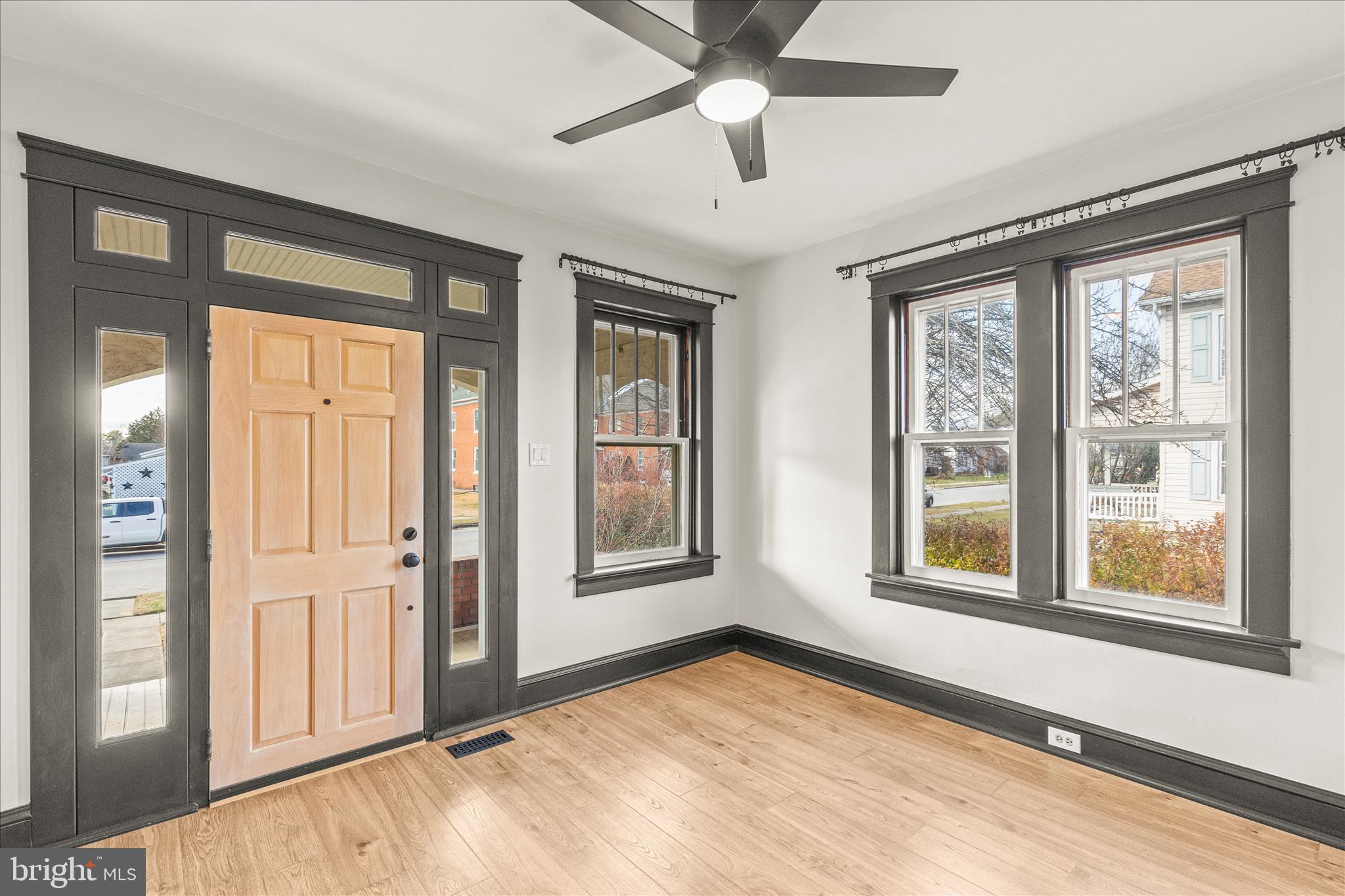 500 South Franklin Street Hanover, PA 17331 - Photo 7 of 36 a view of an empty room with a window and a kitchen