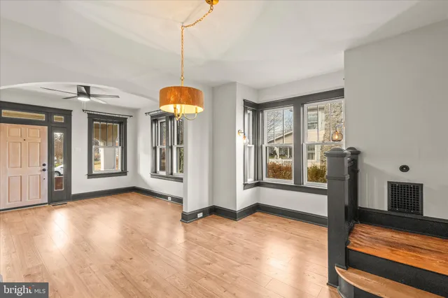 a view of entryway with wooden floor