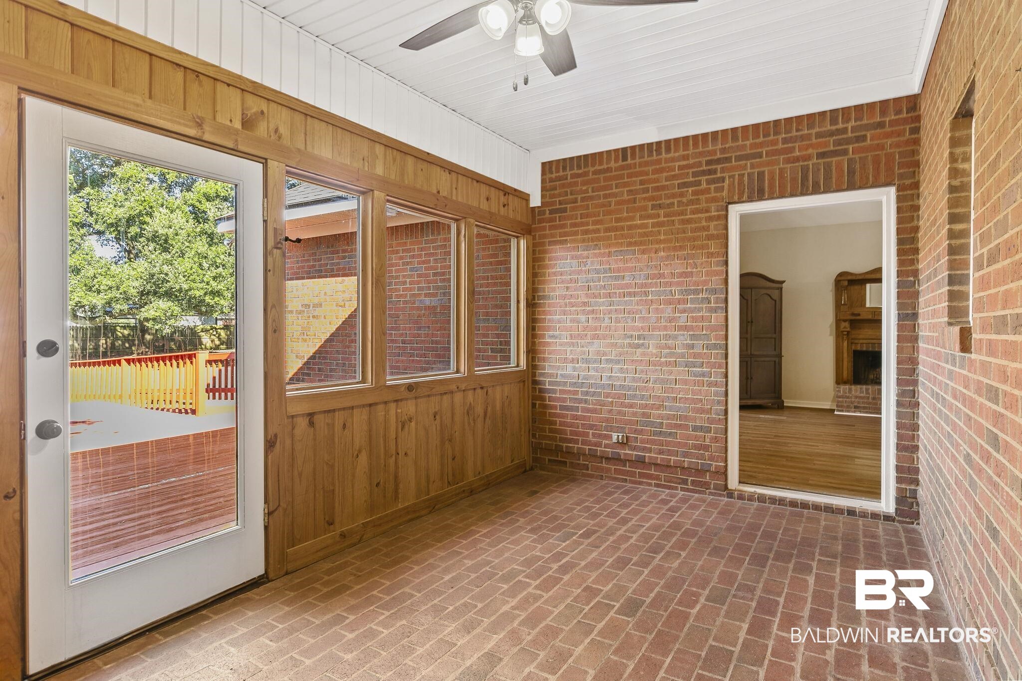 9631 Bay Meadows Avenue Fairhope, AL 36532 - Photo 36 of 49 Unfurnished sunroom featuring ceiling fan