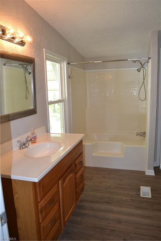 647 Lowe Road Madison, NC 27025 - Photo 13 of 30 Master bath, Garden tub/shower