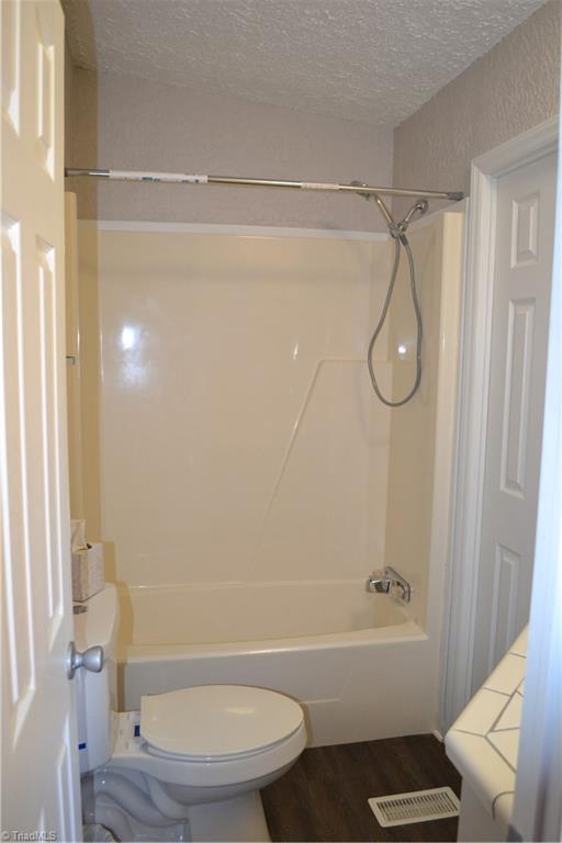 647 Lowe Road Madison, NC 27025 - Photo 17 of 30 Hall bath tub/shower