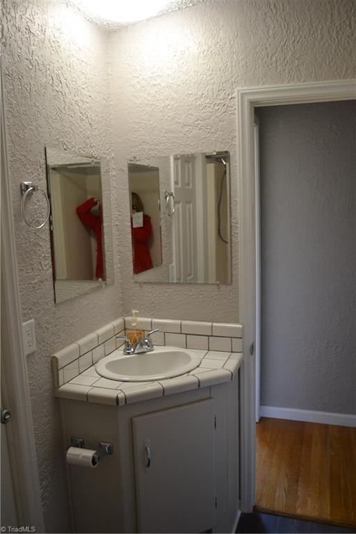 647 Lowe Road Madison, NC 27025 - Photo 18 of 30 Hall bathroom sink