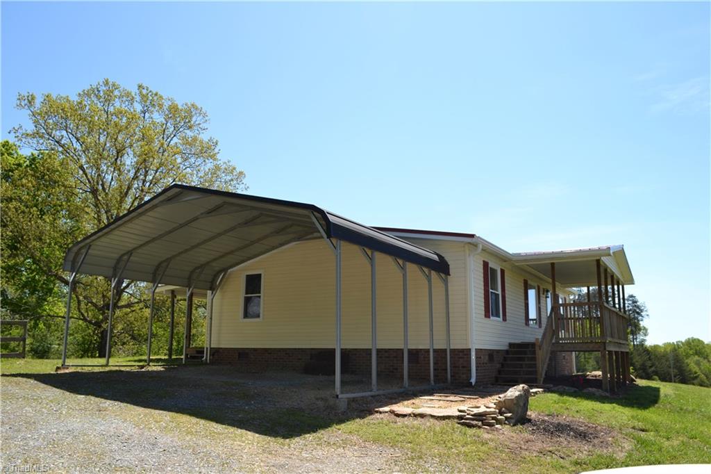 647 Lowe Road Madison, NC 27025 - Photo 23 of 30 Double car carport
