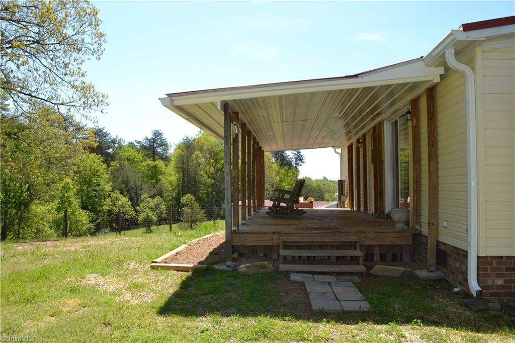 647 Lowe Road Madison, NC 27025 - Photo 24 of 30 Covered back porch complete privacy in back