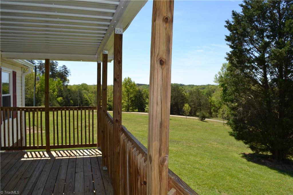 647 Lowe Road Madison, NC 27025 - Photo 25 of 30 Front covered porch