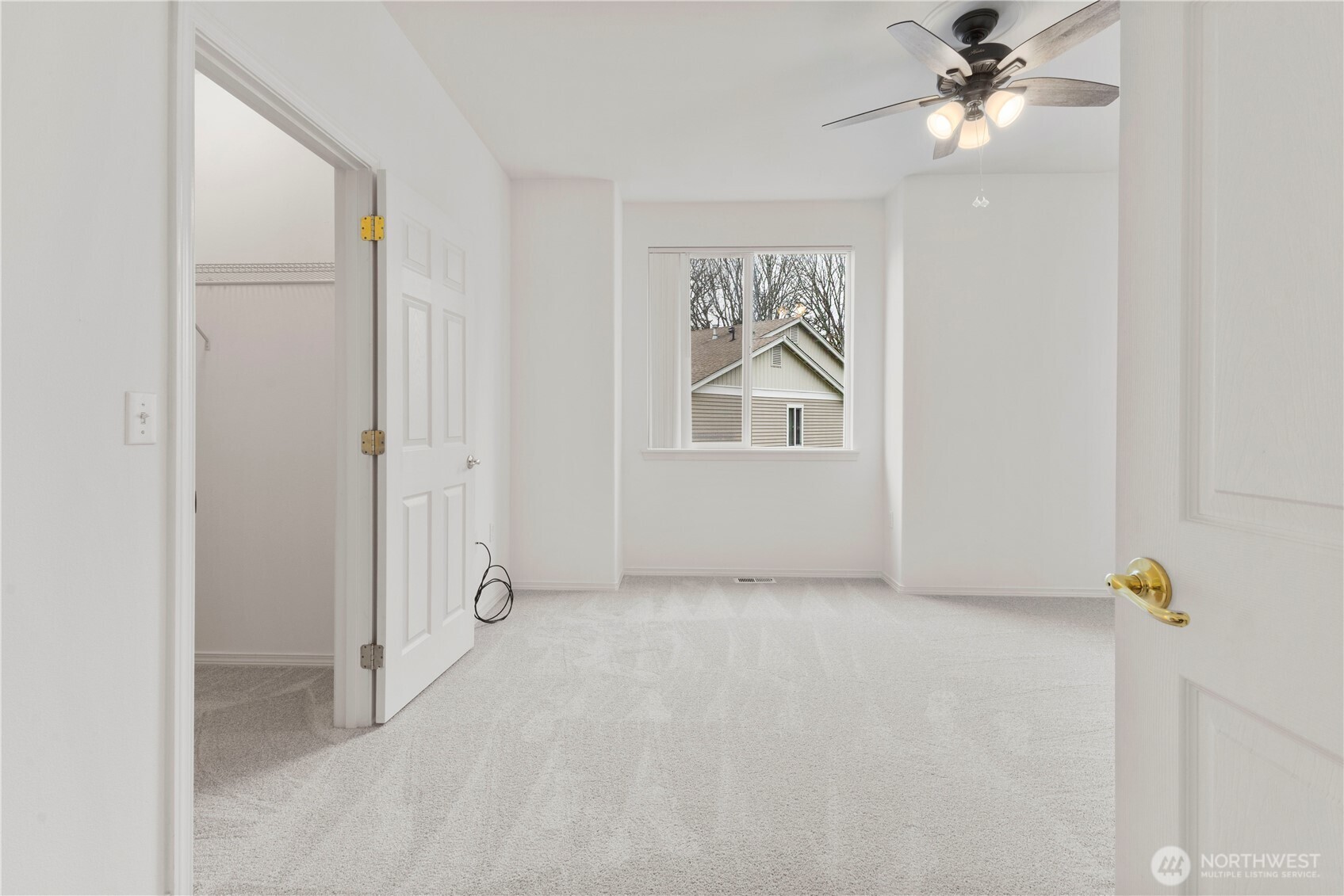 3220 Southeast 12th Street, Unit 1039 Renton, WA 98058 - Photo 19 of 27 a view of empty room with windows