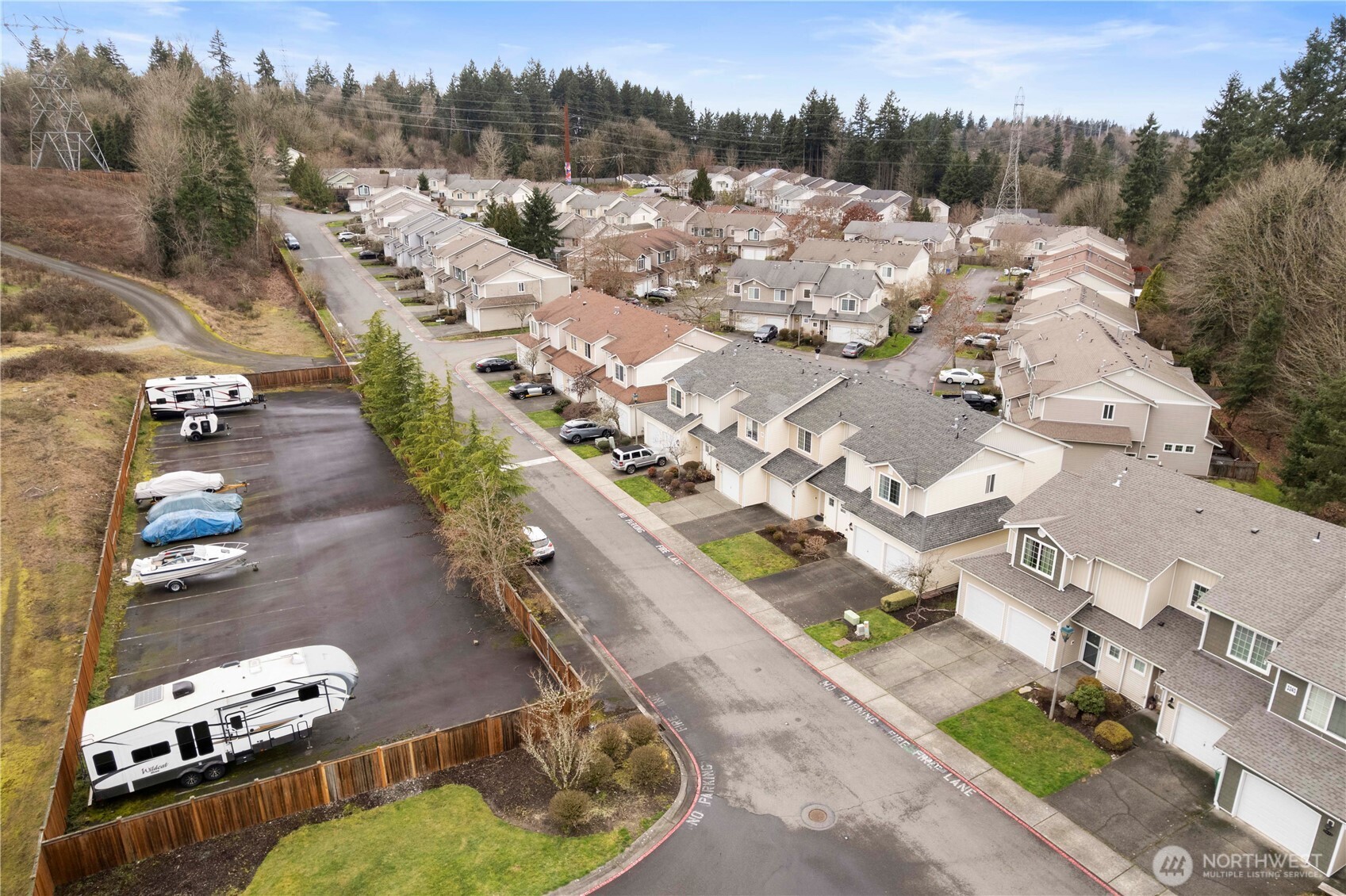 3220 Southeast 12th Street, Unit 1039 Renton, WA 98058 - Photo 2 of 27 an aerial view of a house with yard swimming pool and outdoor seating