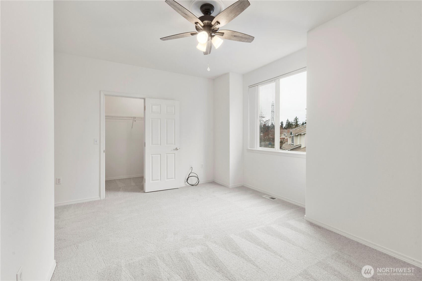 3220 Southeast 12th Street, Unit 1039 Renton, WA 98058 - Photo 21 of 27 a view of an empty room with a window