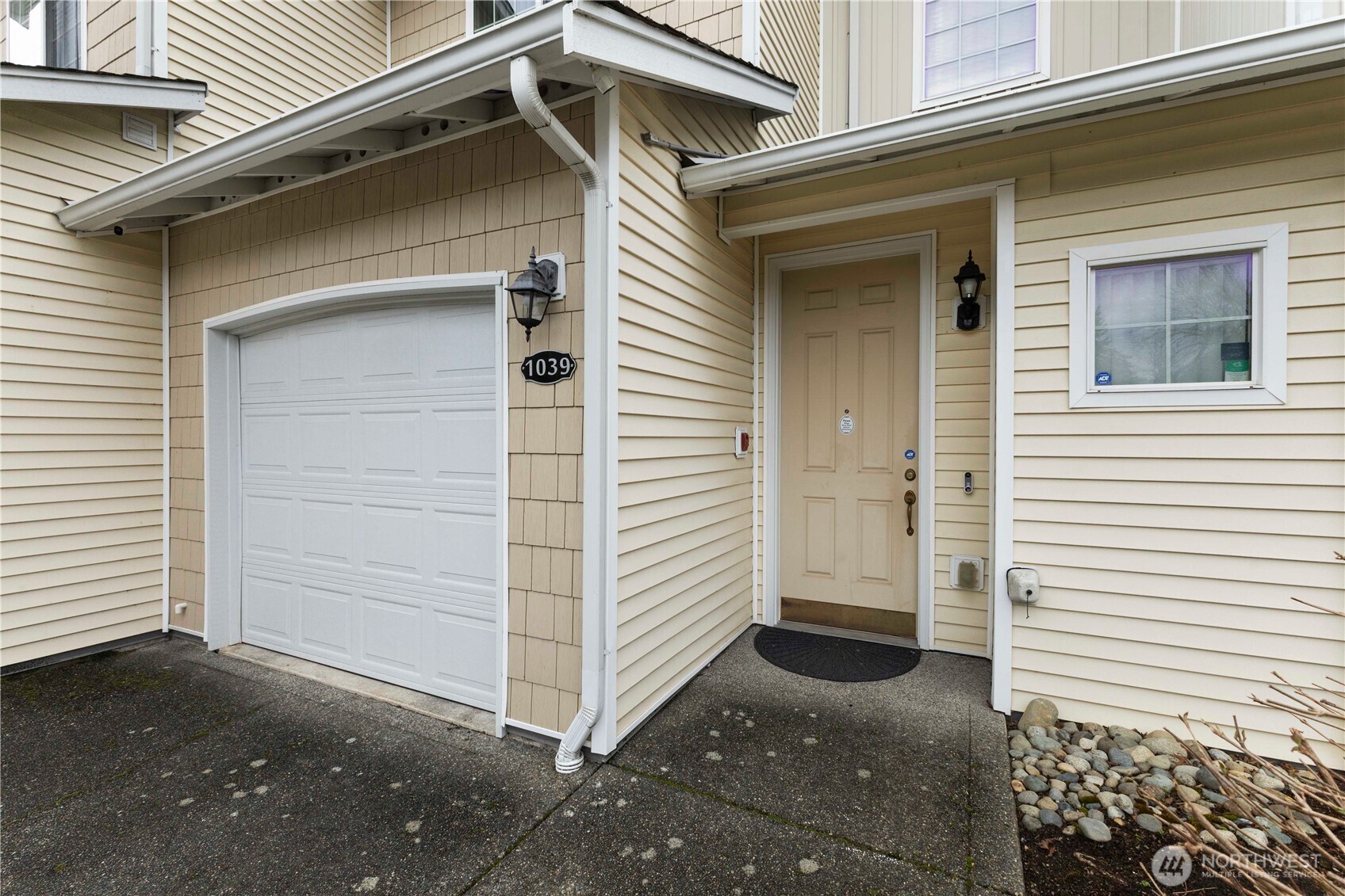 3220 Southeast 12th Street, Unit 1039 Renton, WA 98058 - Photo 27 of 27 a view of a house with white door