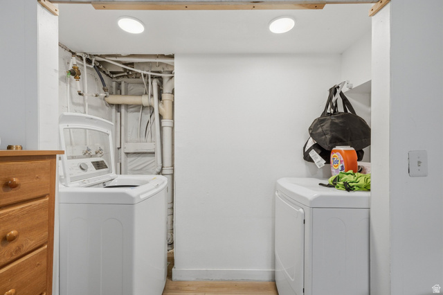 707 East 150 South Provo, UT 84606 - Photo 25 of 31 Dedicated laundry area featuring a top-load washing machine, front-load dryer, and recessed lighting