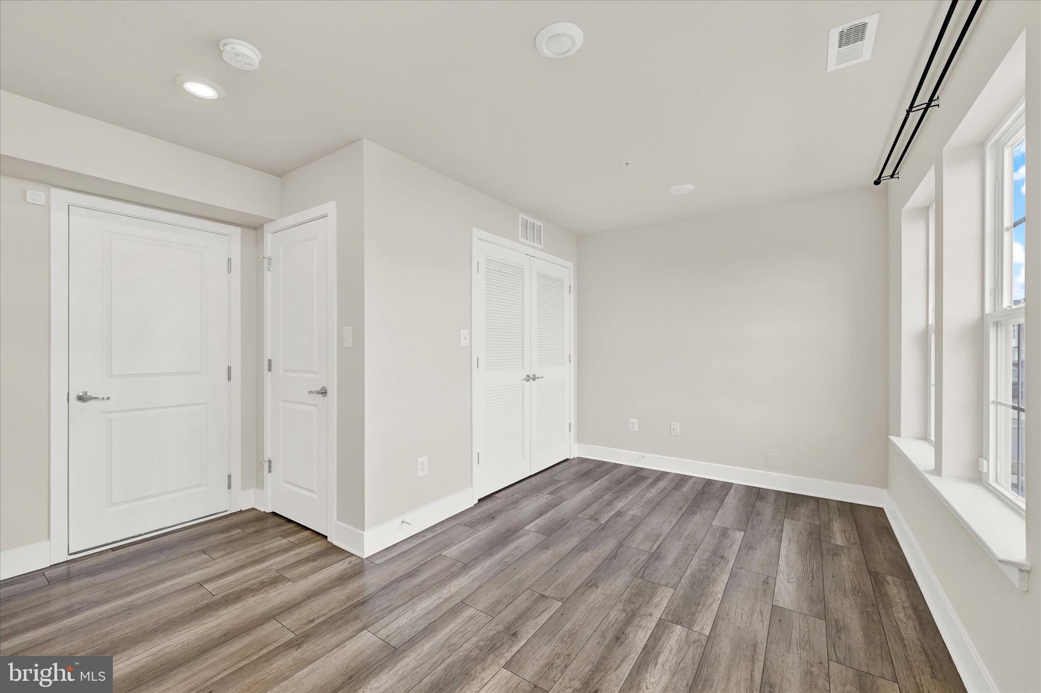 7797 Barrensdale Road Windsor Mill, MD 21244 - Photo 3 of 24 Luxury flooring and recessed lighting