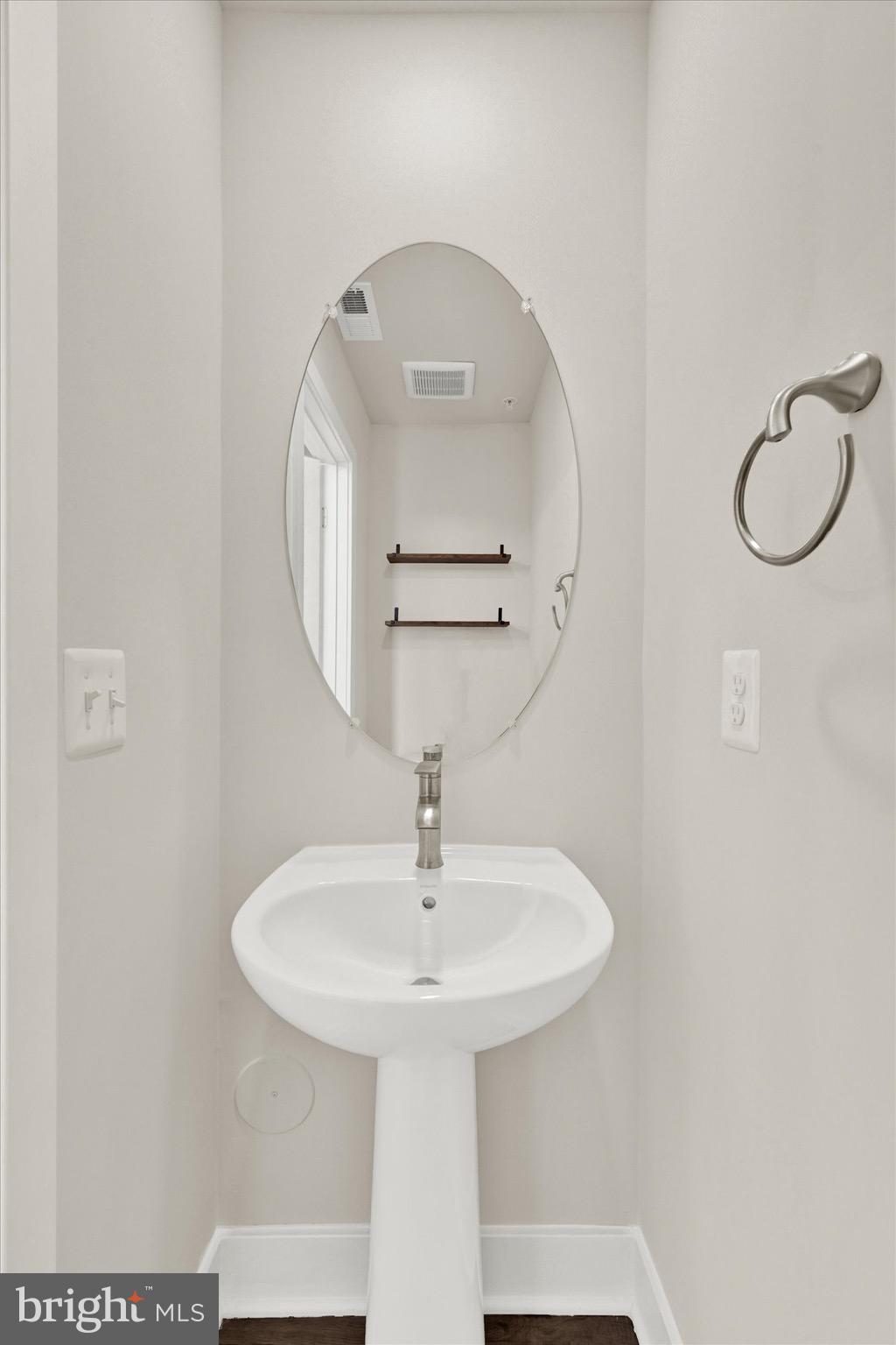 7797 Barrensdale Road Windsor Mill, MD 21244 - Photo 4 of 24 Half bath on first level