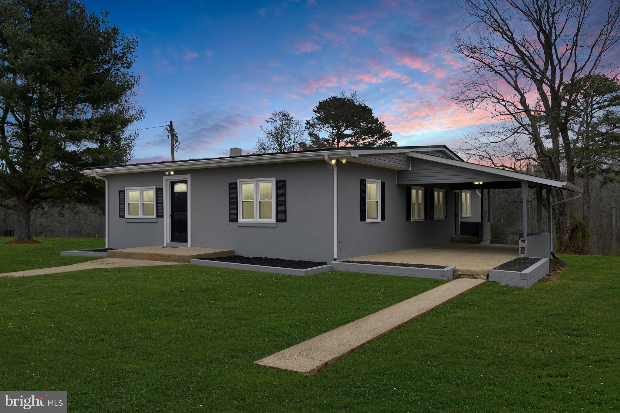 11359 Old Stillhouse Road Boston, VA 22713 - Photo 1 of 43 Front shot with virtual green grass