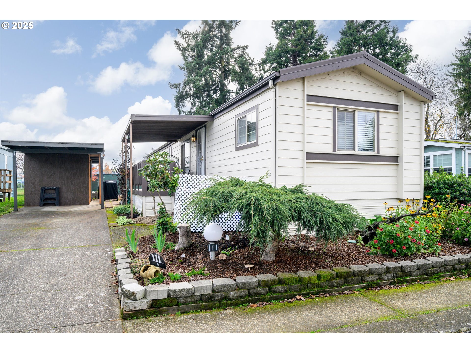 a view of a house with backyard porch and sitting area