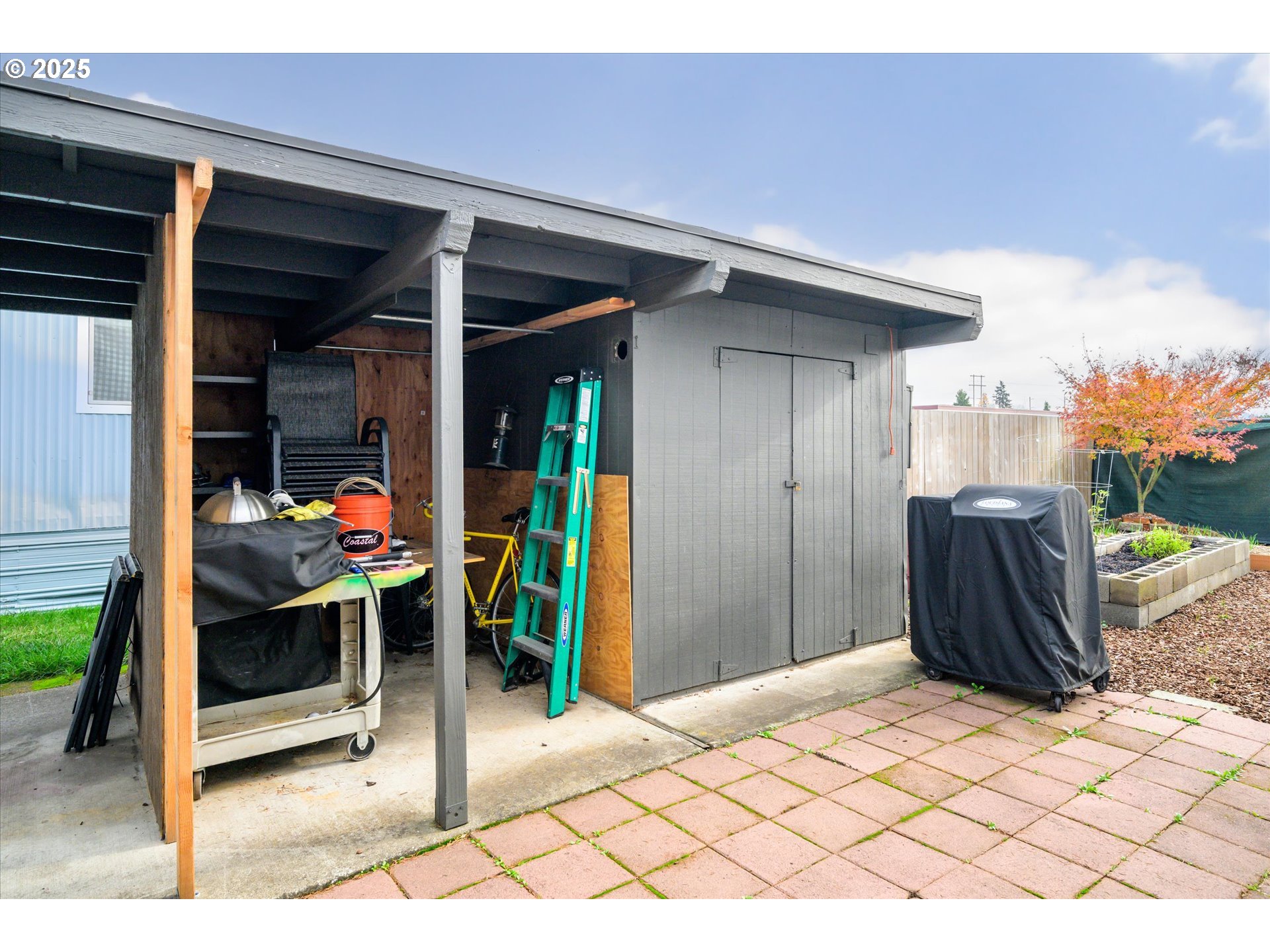 2150 Laura Street, Unit 111 Springfield, OR 97477 - Photo 23 of 30 a view of a outdoor space with porch