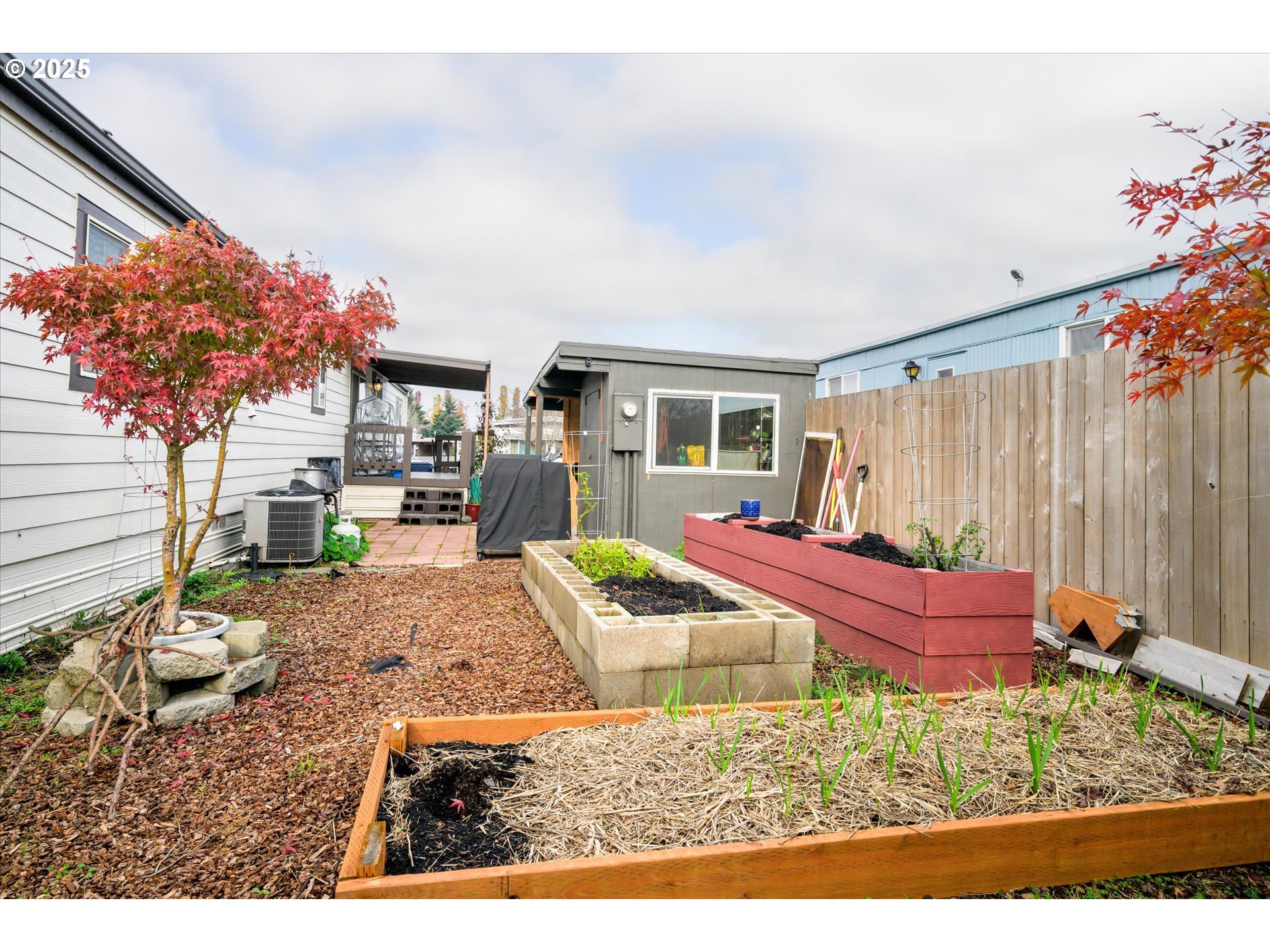 2150 Laura Street, Unit 111 Springfield, OR 97477 - Photo 25 of 30 a front view of a house with garden