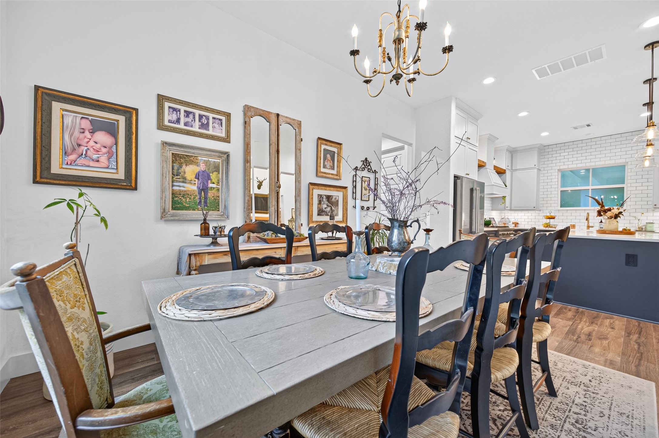 10915 Ruger Road Willis, TX 77378 - Photo 19 of 50 a view of a dining room with furniture and a chandelier