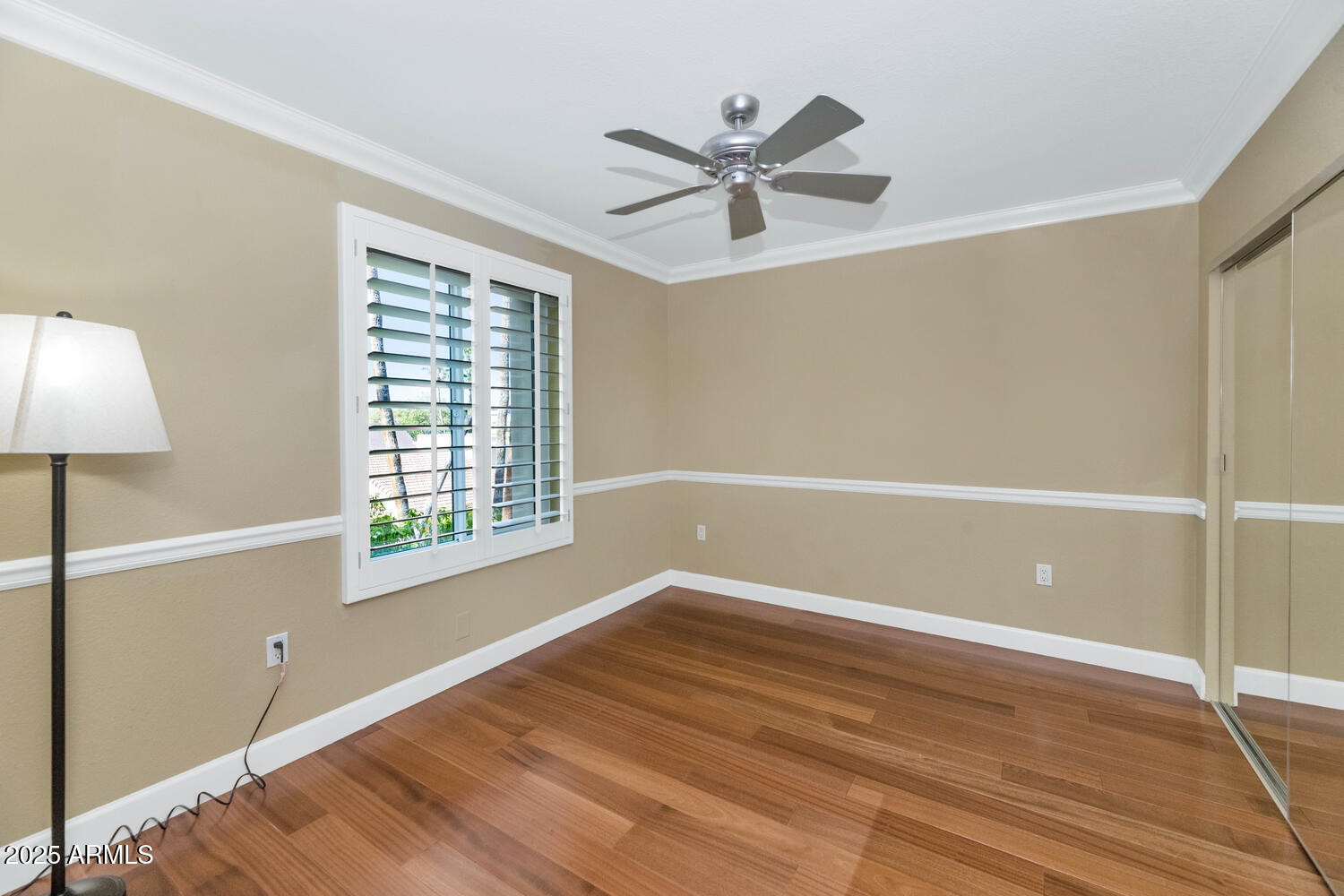 4200 North Miller Road, Unit 328 Scottsdale, AZ 85251 - Photo 14 of 22 a view of a big room with wooden floor and windows