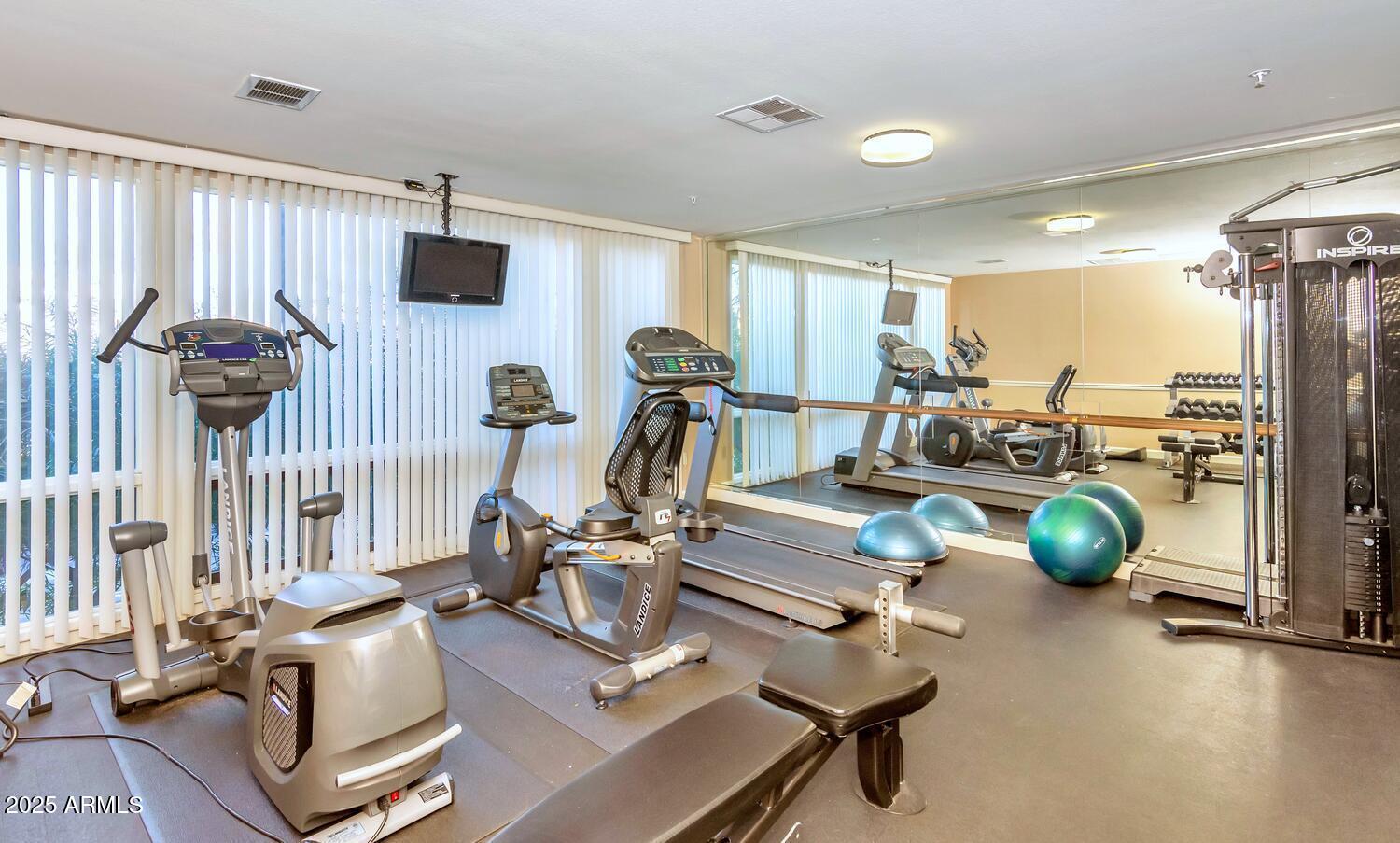 4200 North Miller Road, Unit 328 Scottsdale, AZ 85251 - Photo 21 of 22 a view of a room with gym equipment