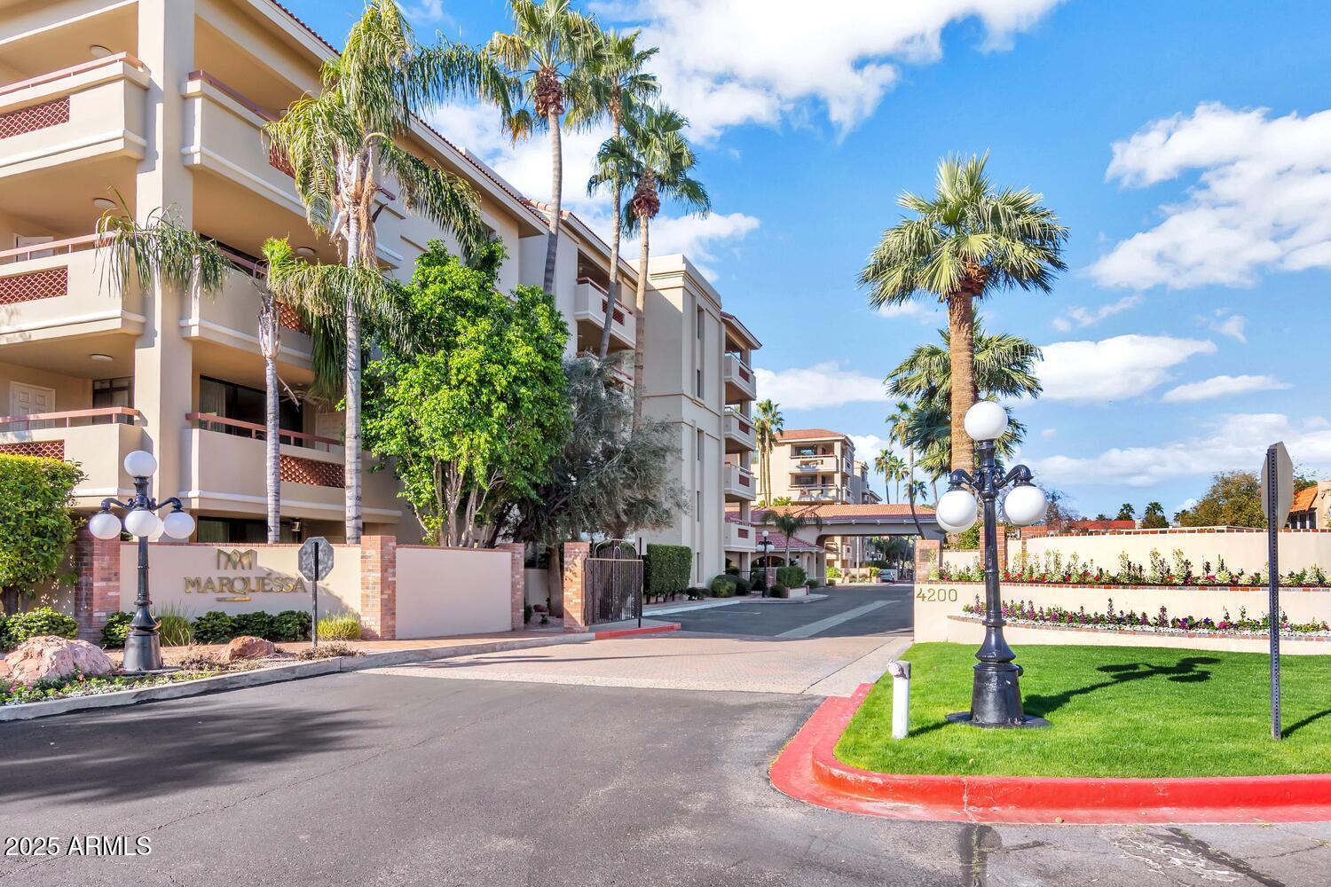 4200 North Miller Road, Unit 328 Scottsdale, AZ 85251 - Photo 7 of 22 a view of a street with houses a street and trees