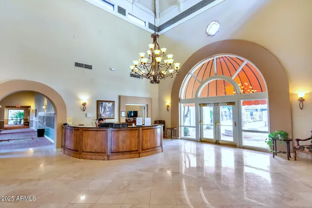 a view of a living room and a chandelier