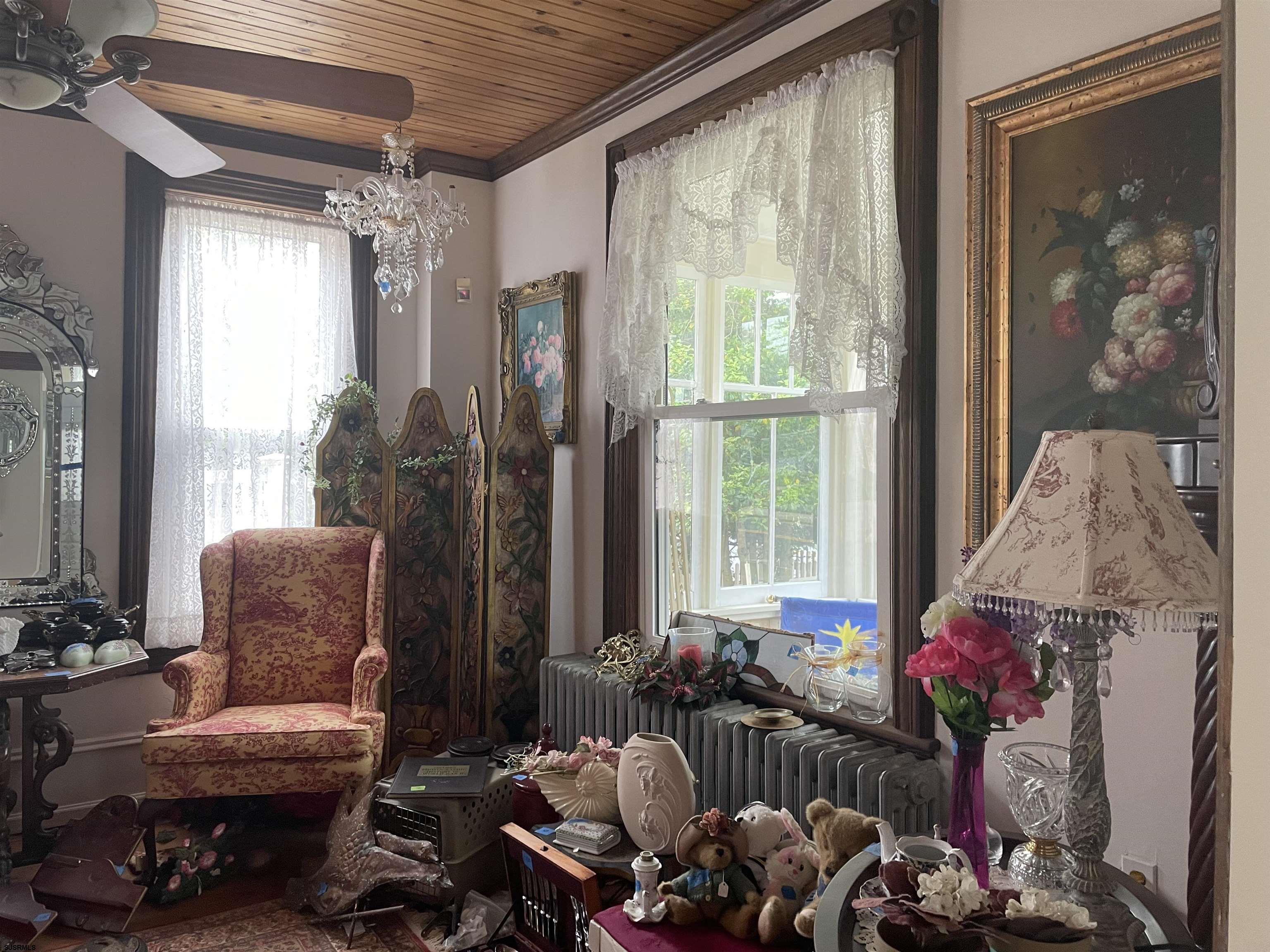 636 Shore Road Somers Point, NJ 08244 - Photo 16 of 25 a living room filled with furniture and a large window
