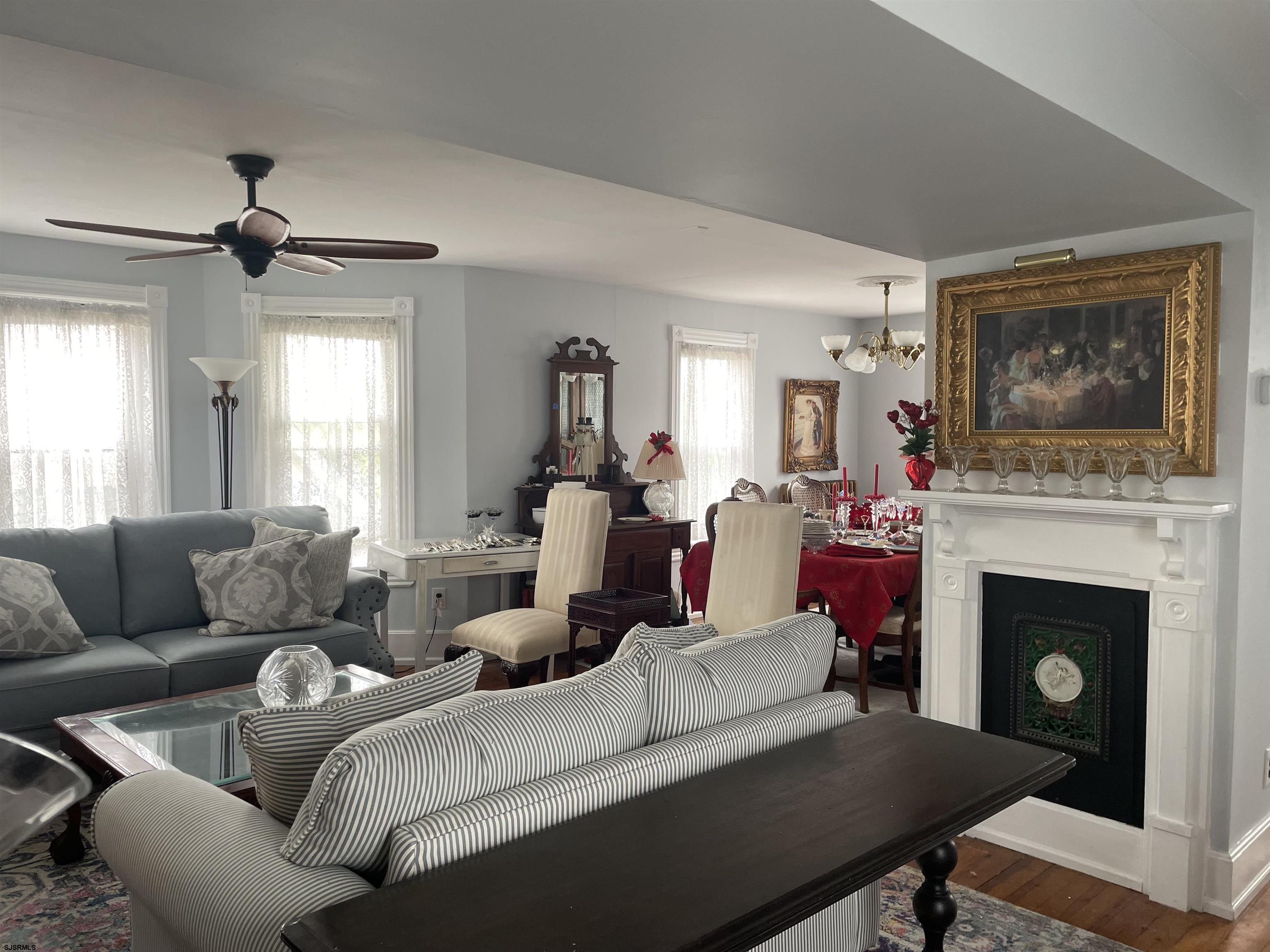 636 Shore Road Somers Point, NJ 08244 - Photo 2 of 25 a living room with furniture and a fireplace