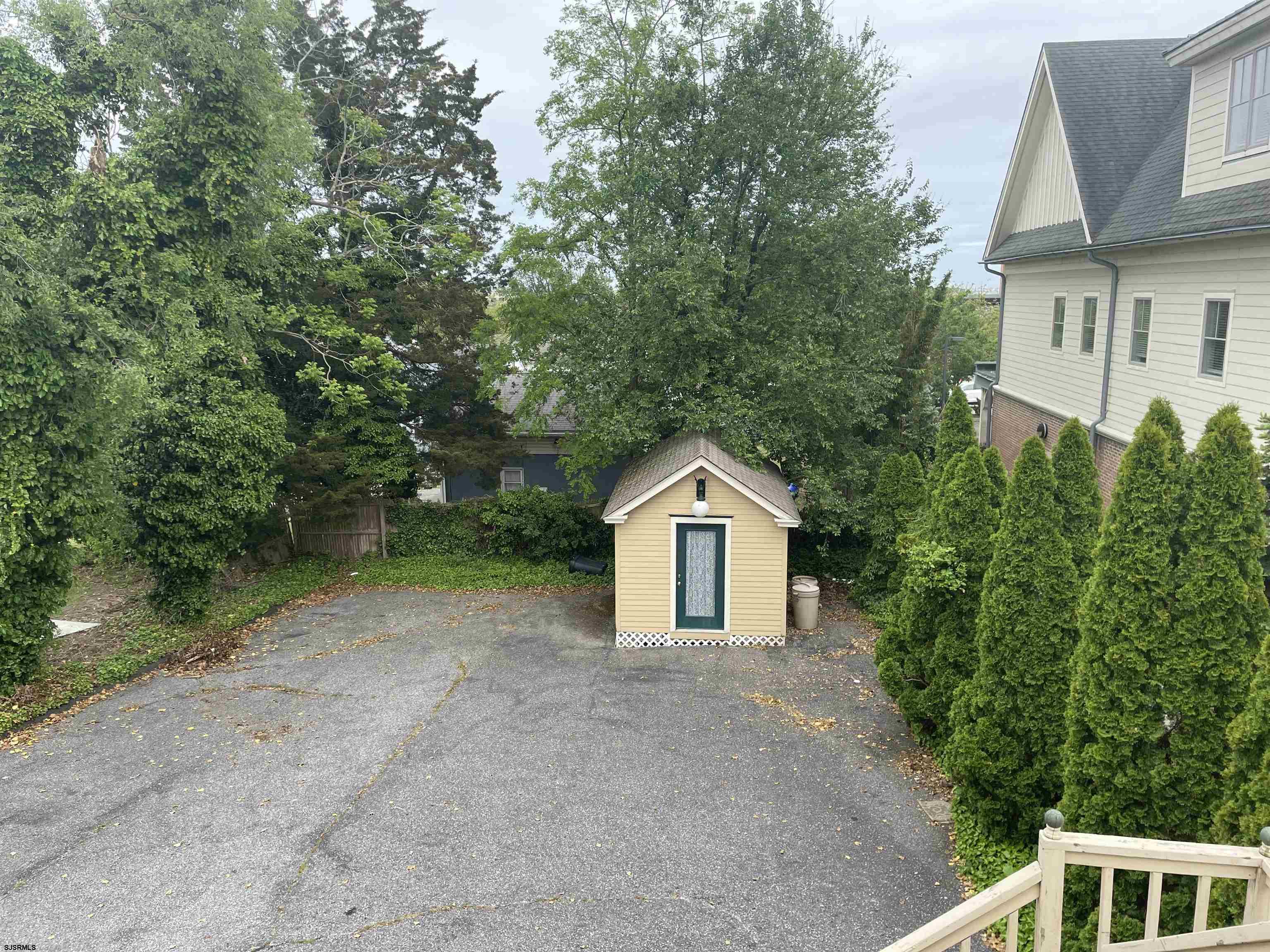 636 Shore Road Somers Point, NJ 08244 - Photo 24 of 25 a view of backyard of house with green space