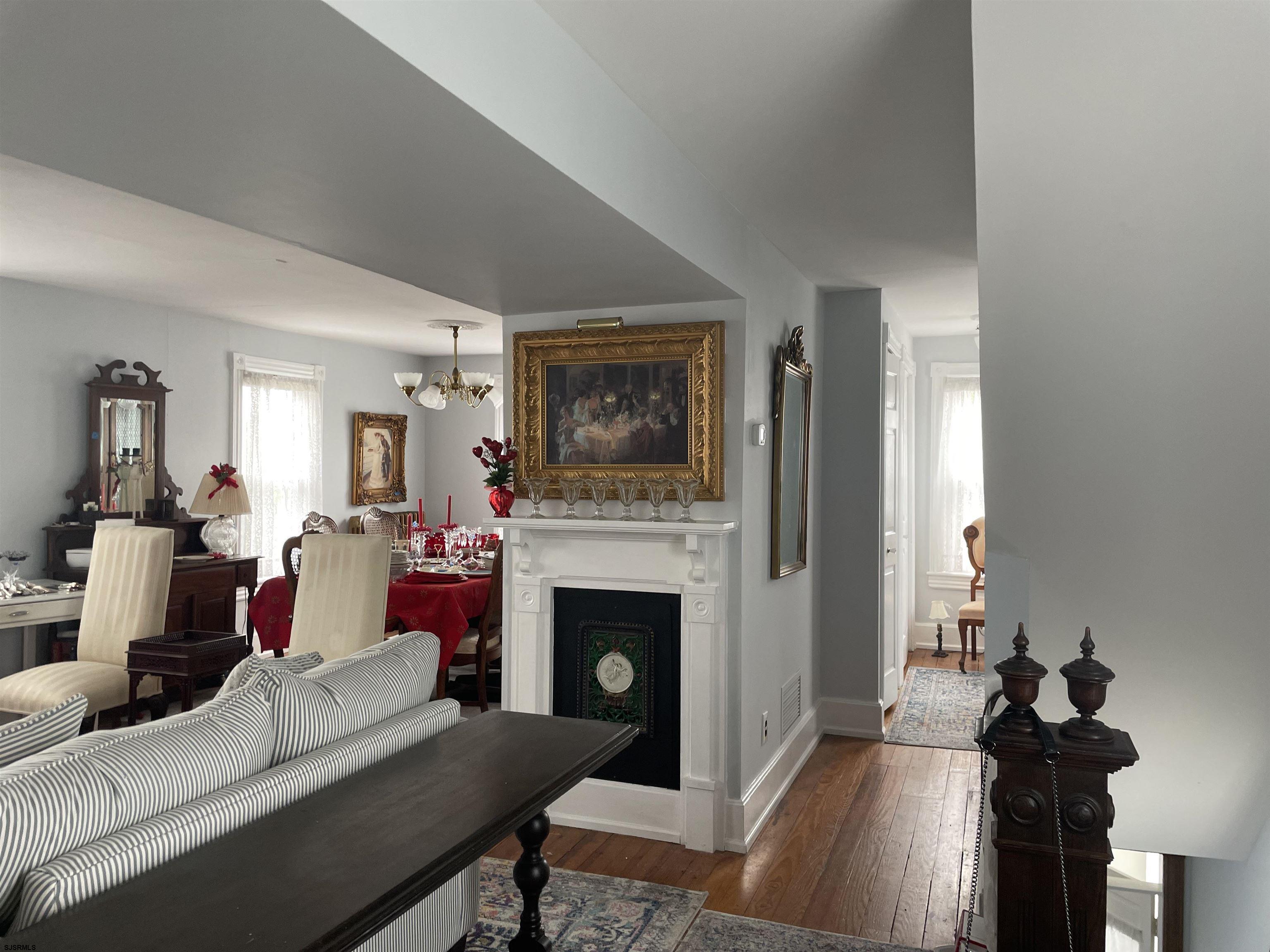 636 Shore Road Somers Point, NJ 08244 - Photo 5 of 25 a living room with furniture and a fireplace