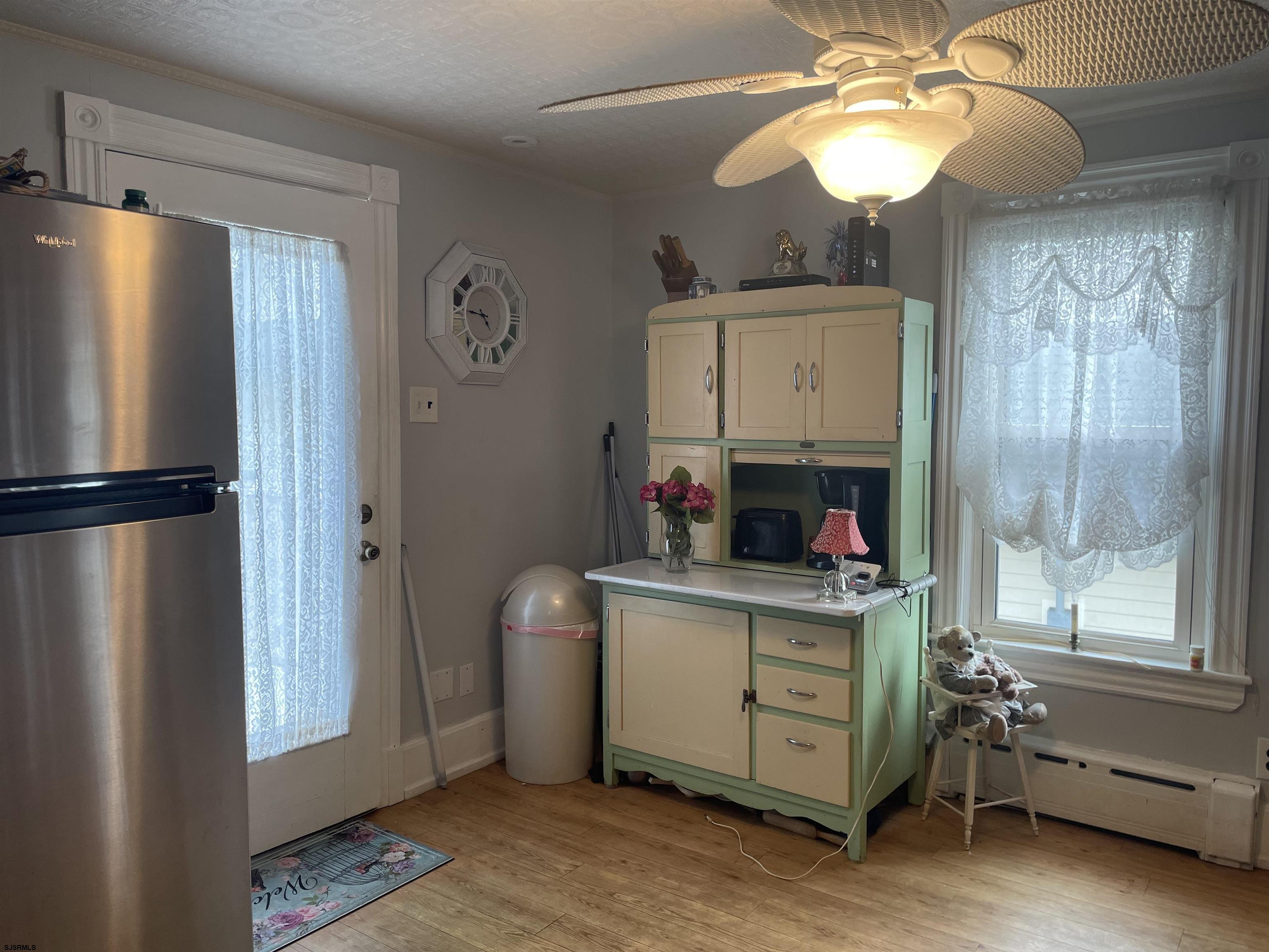 636 Shore Road Somers Point, NJ 08244 - Photo 10 of 25 a room with cabinets and wooden floor