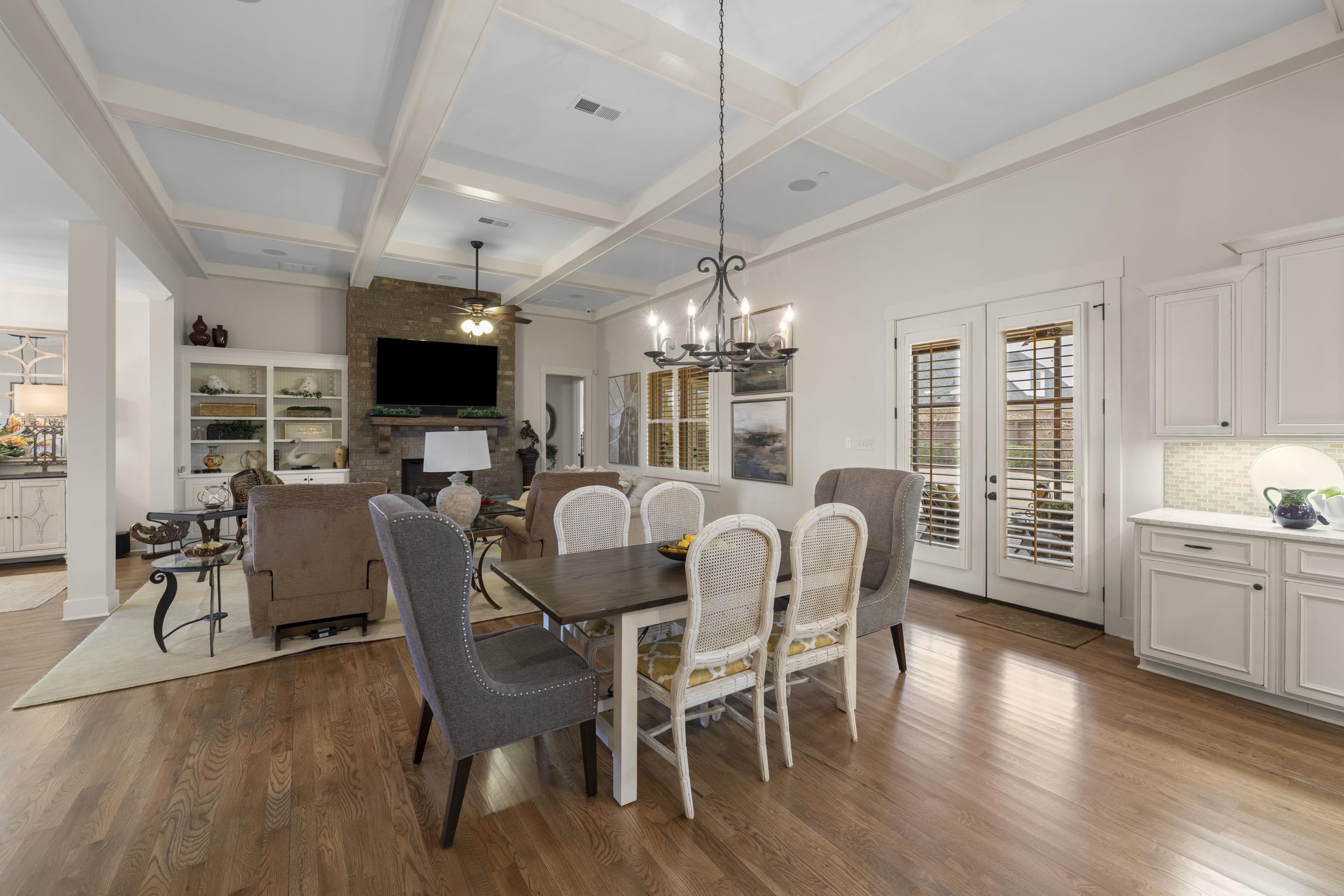 195 Hunters Rest Lane Piperton, TN 38017 - Photo 13 of 36 a view of a dining room with furniture window and wooden floor
