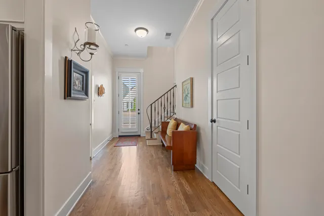 a view of entryway with wooden floor