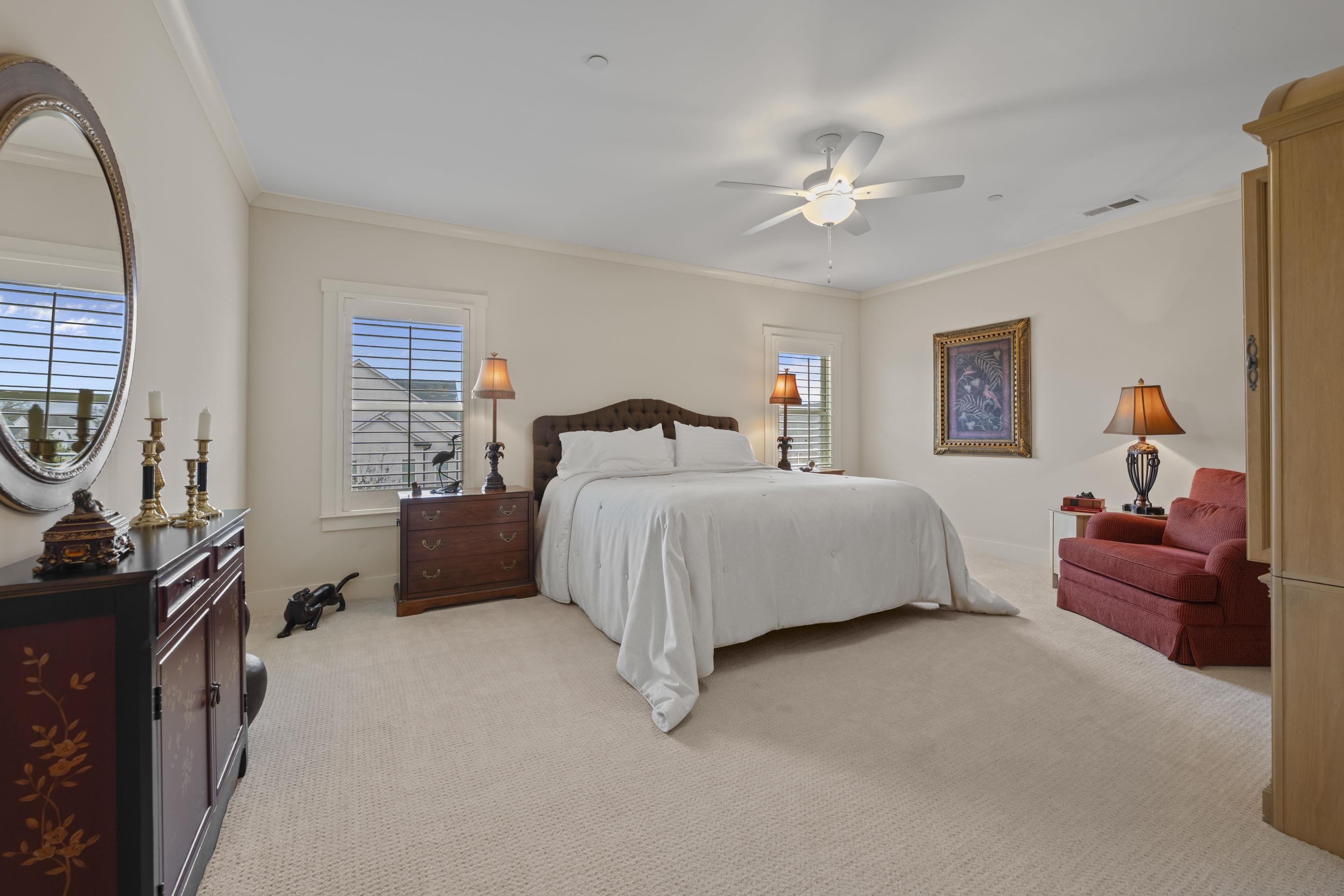 195 Hunters Rest Lane Piperton, TN 38017 - Photo 31 of 36 a bedroom with a bed couch and a window