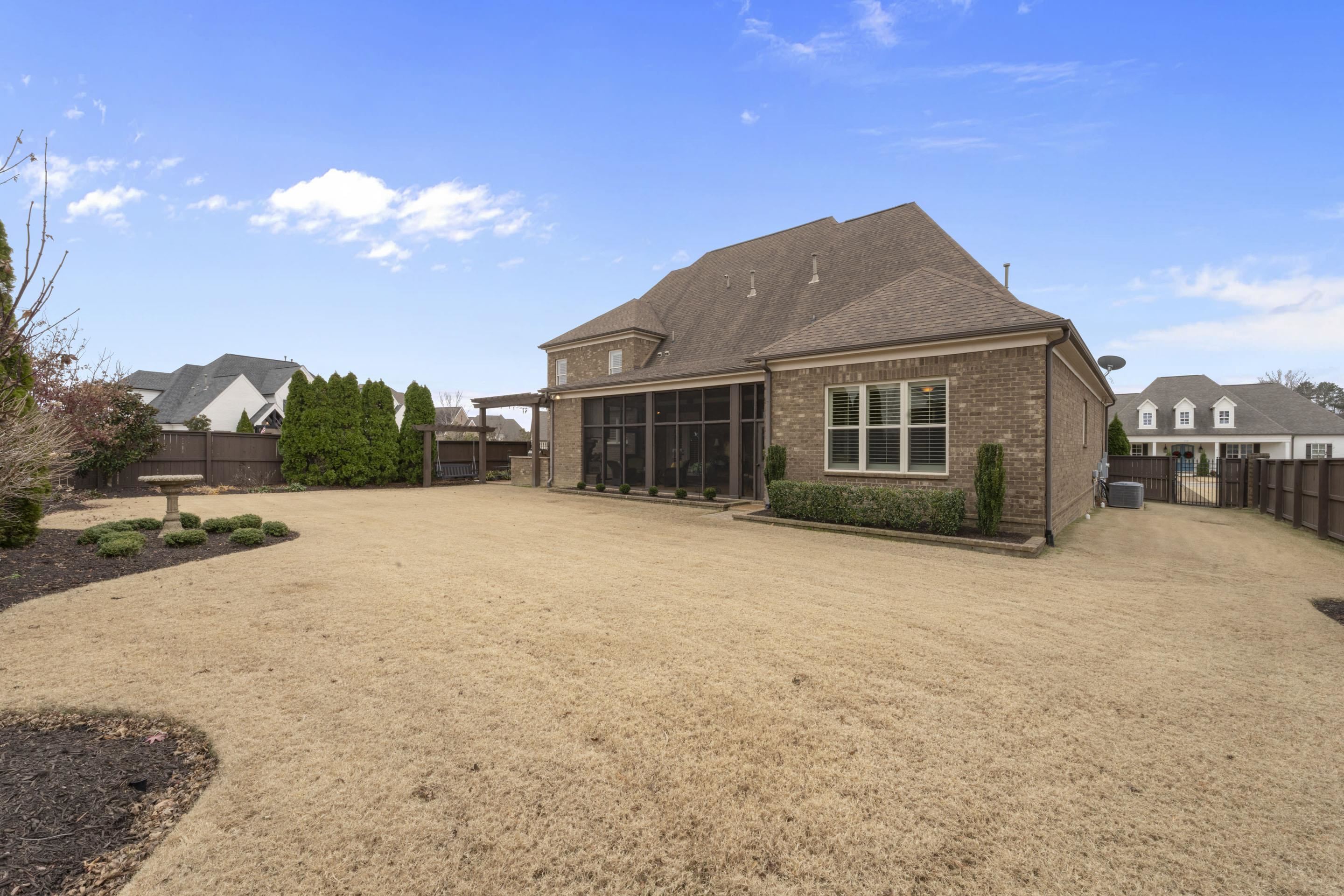 195 Hunters Rest Lane Piperton, TN 38017 - Photo 5 of 36 a front view of a house with a yard and garage