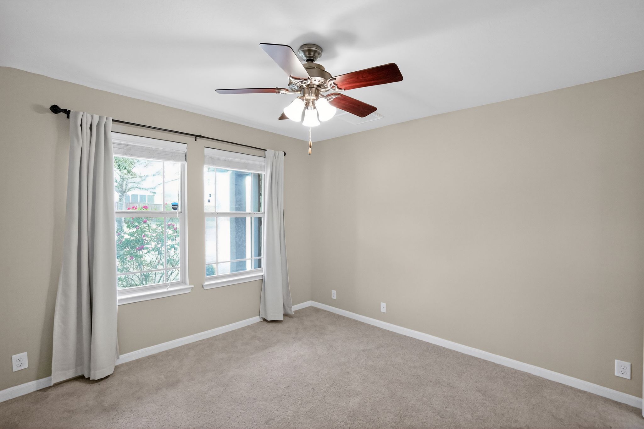 1313 April Meadows Loop Georgetown, TX 78626 - Photo 6 of 21 Unfurnished room with ceiling fan and light colored carpet